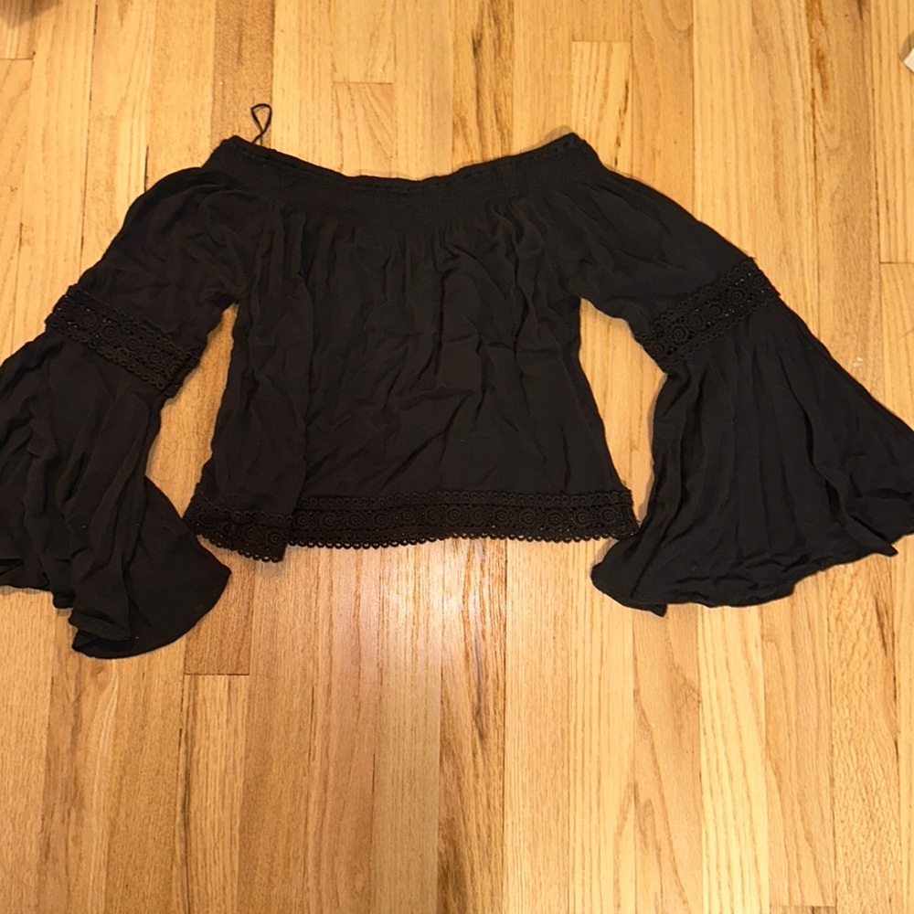 off-the-shoulder black hippie-style top